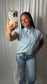 Women's light blue and white striped short sleeve button down shirt with chest pocket