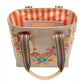 Colorful tote bag with floral embroidery and striped interior on a white background