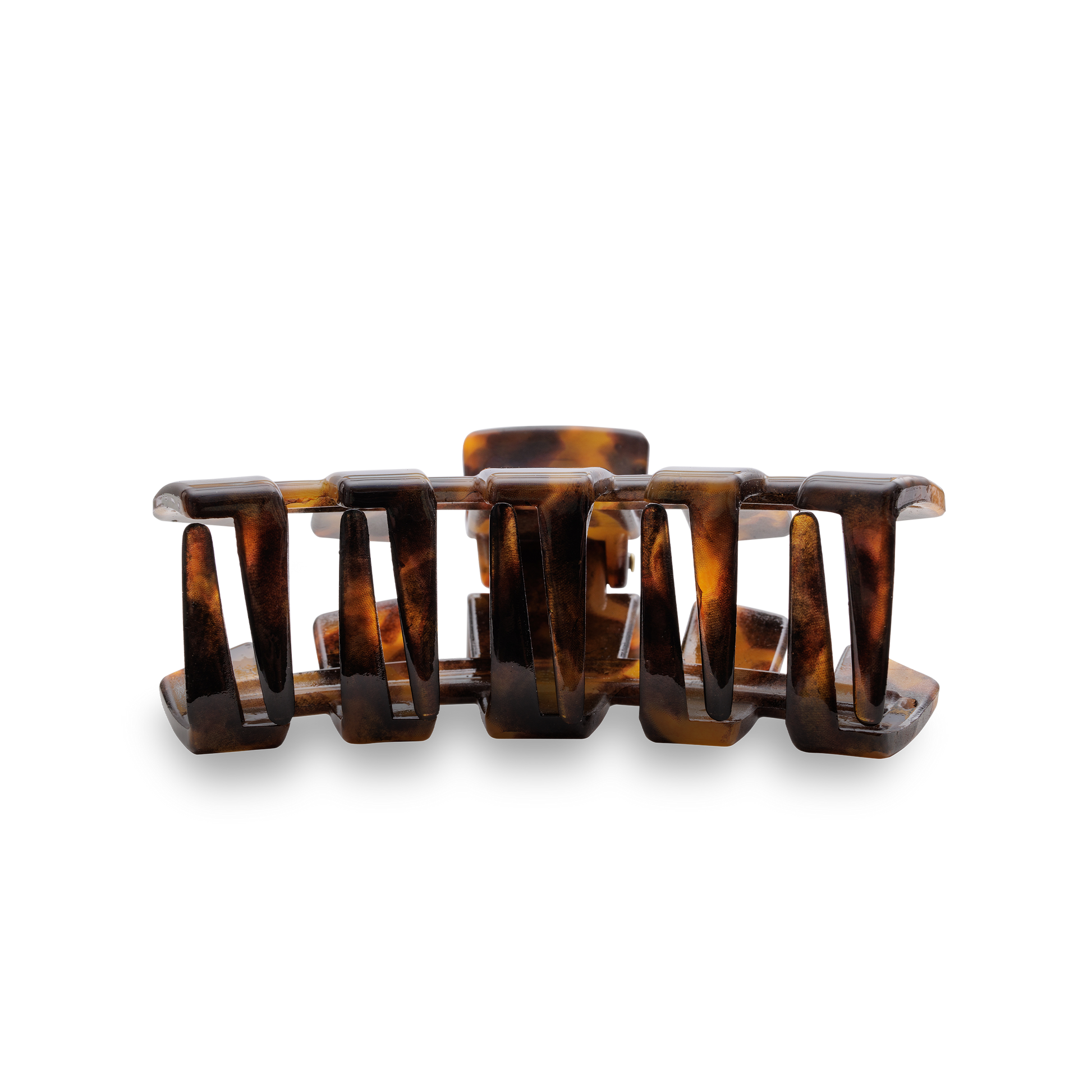 Tortoiseshell hair clip on a white background