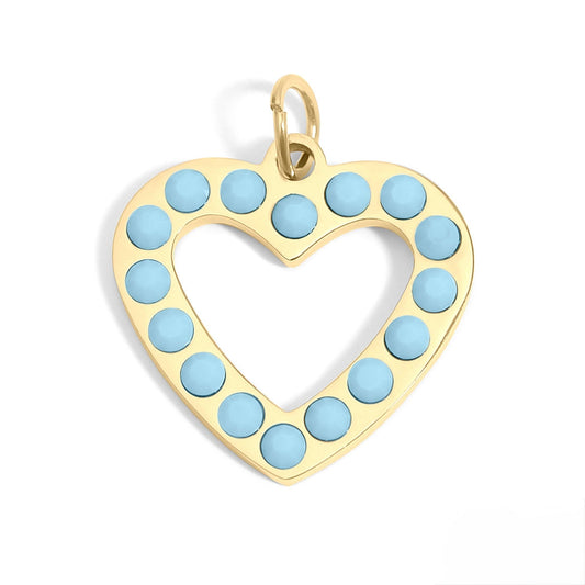 Heart-shaped pendant with gold frame and light blue circular stones on a white background