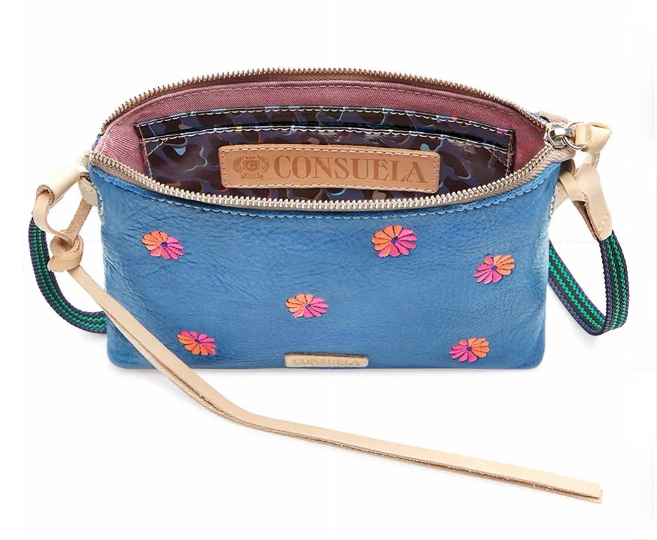 Blue handbag with floral embroidery Consuela branding on a white background
