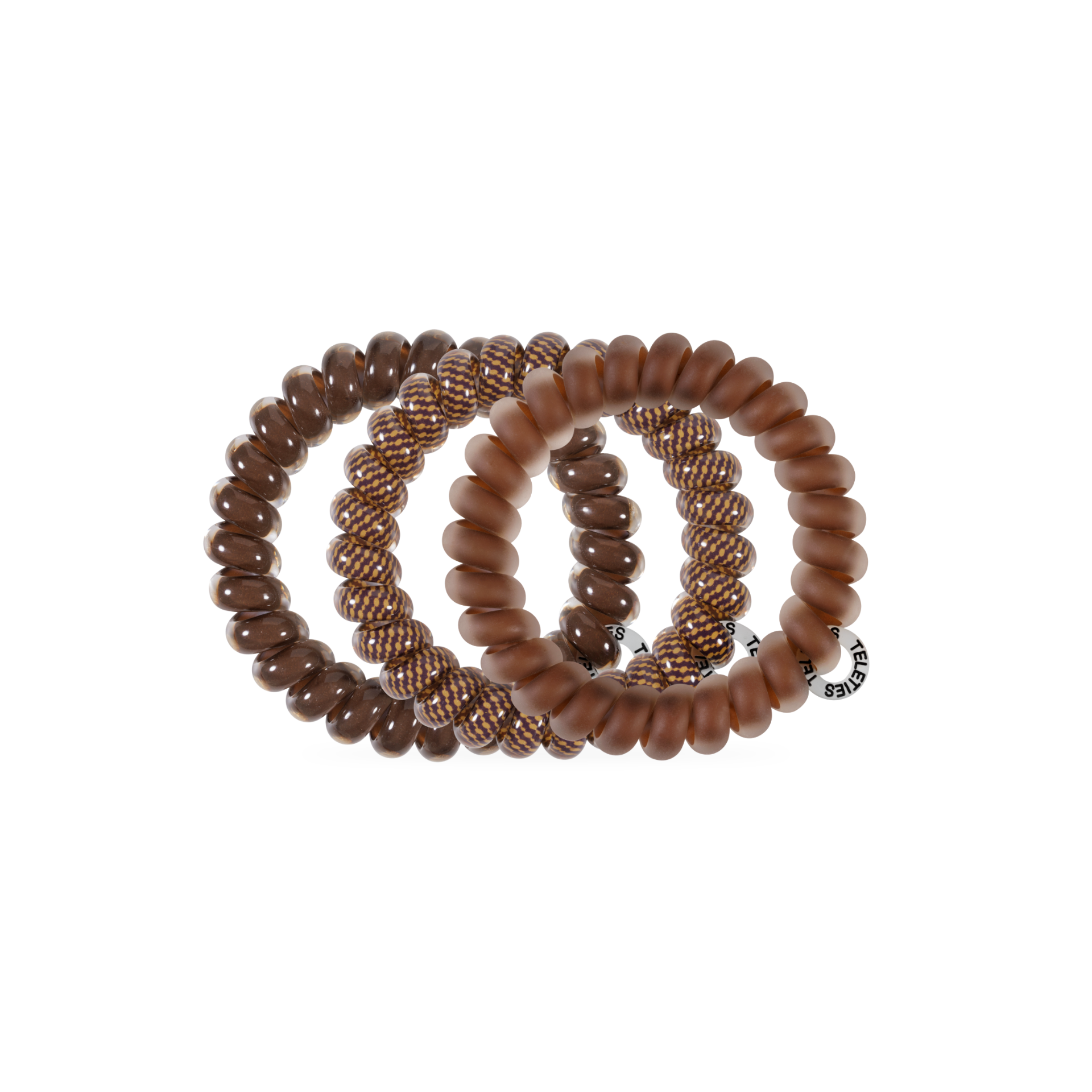 Set of three brown hair ties on a white background