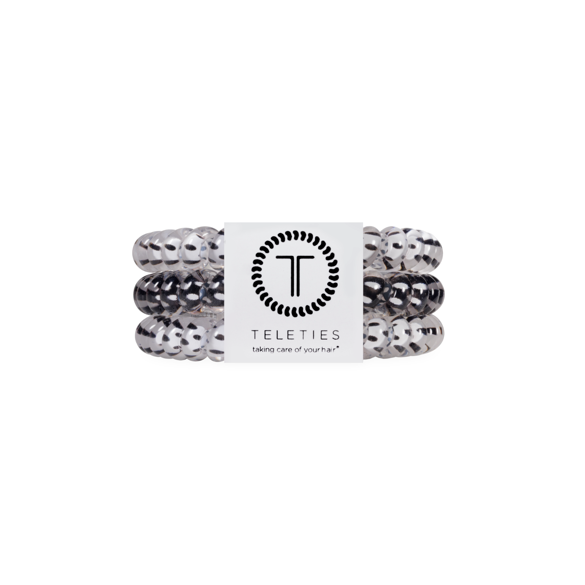 Set of white and black hair ties with a Teleties label on a white background