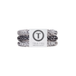 Set of white and black hair ties with a Teleties label on a white background