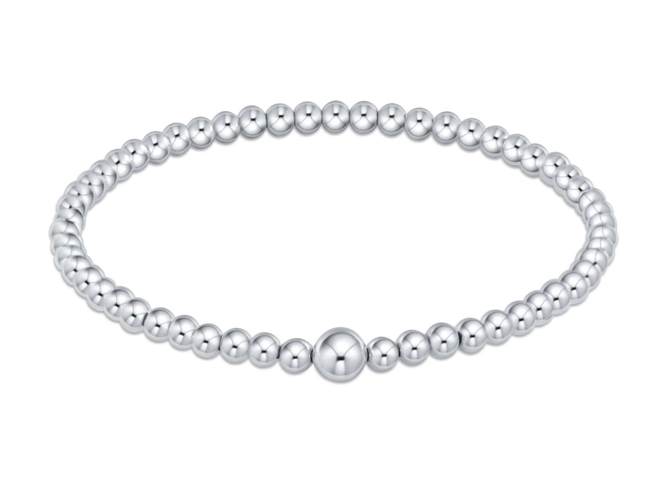 Sterling silver beaded bangle on a white background