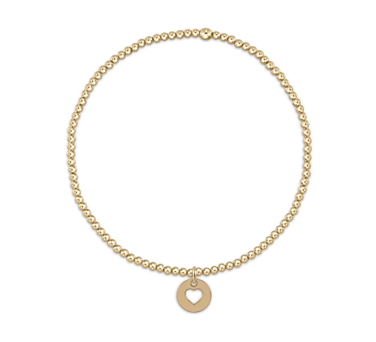 Gold beaded enewton bracelet with gold heart charm on a white background