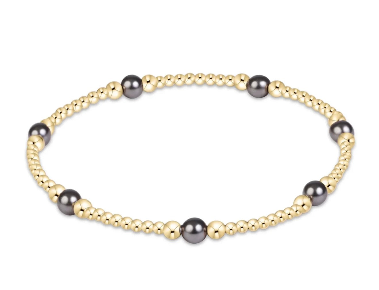 A gold Enewton beaded bracelet with 4mm dark grey purpose pearls on a white background
