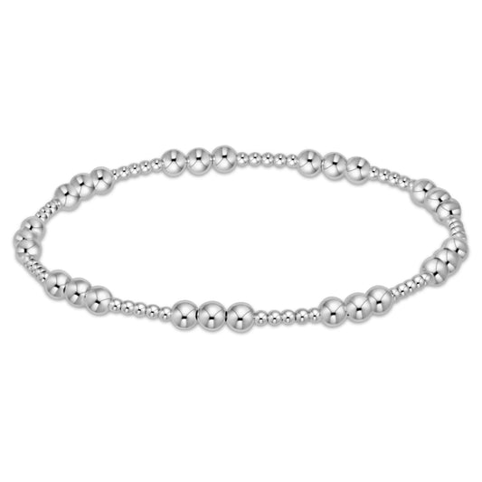 Silver beaded bracelet on a white background