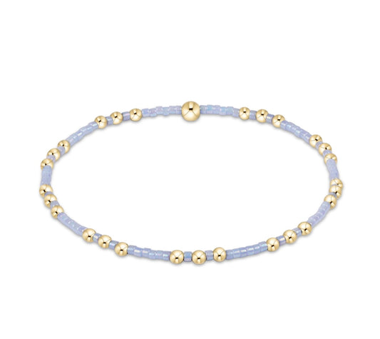 Bracelet with gold and light blue beaded 