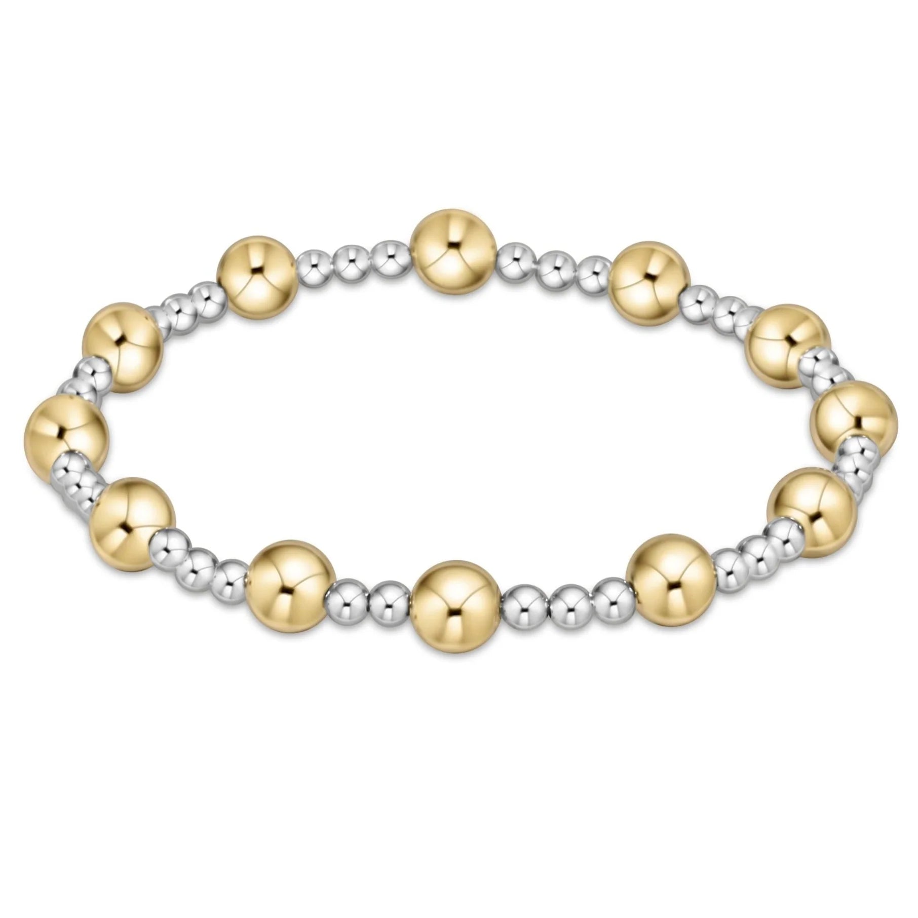 Bracelet with gold and sterling silver beads on a white background