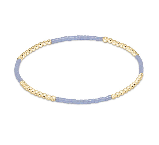 Blue beaded bracelet with gold beads