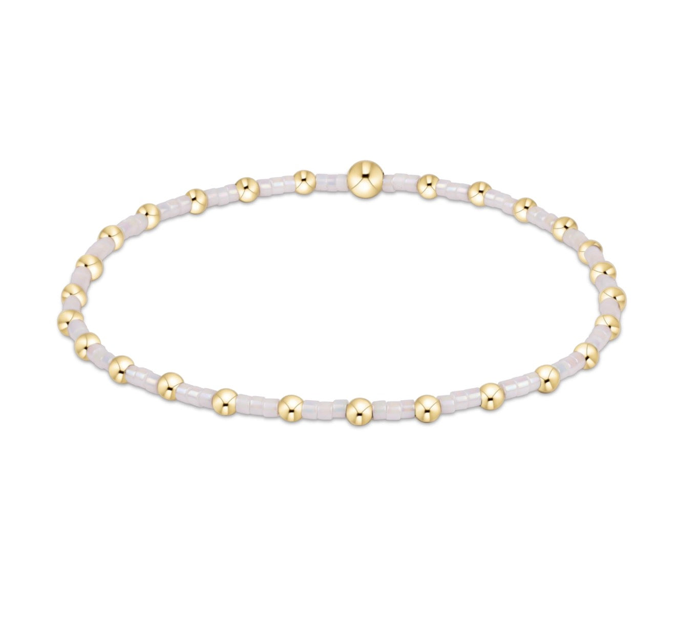 Bracelet with white beads and gold accents on a white background