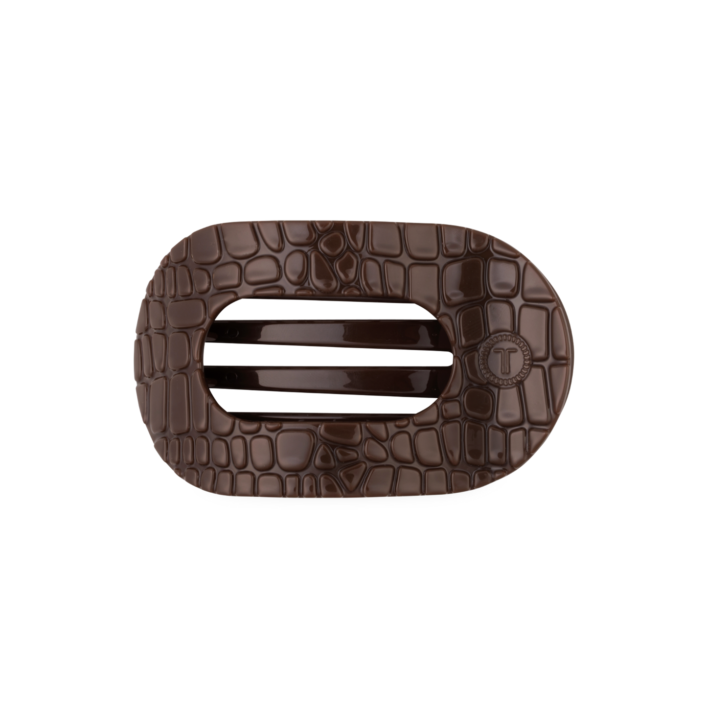Brown crocodile-patterned hair clip with on a white background