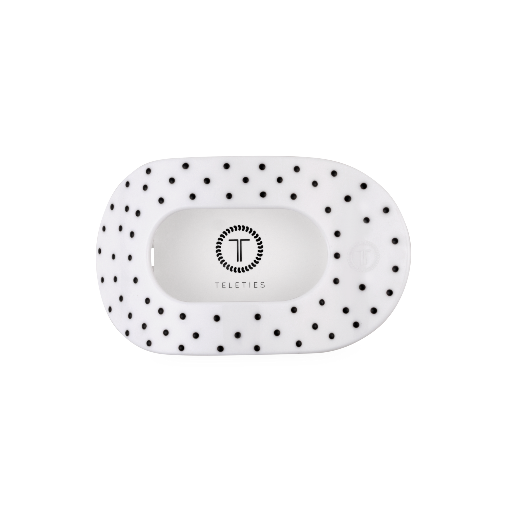 White pouch with black polka dots and 'Teleties' branding on a white background