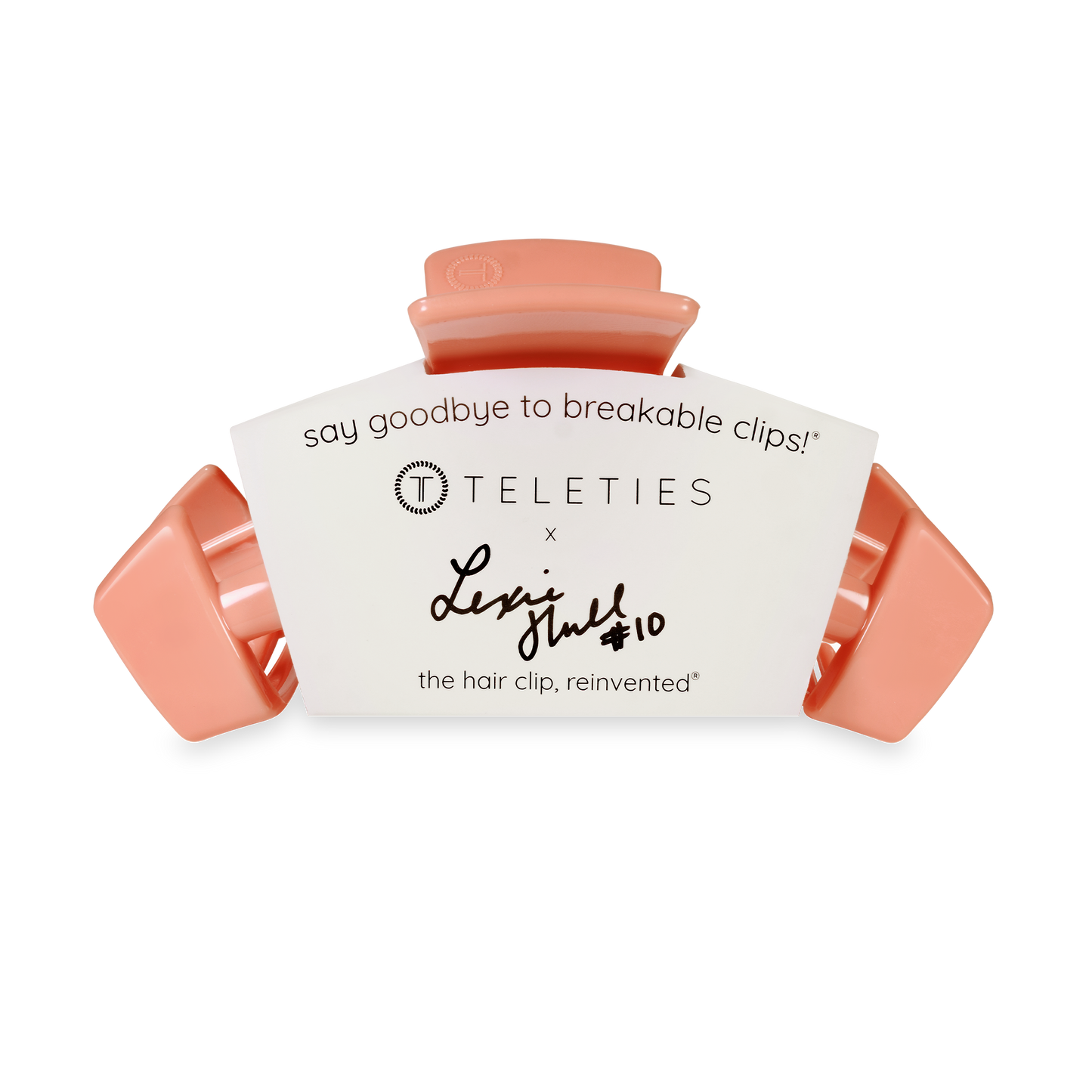 Coral hair clip with white label featuring 'Teleties' branding on a white background