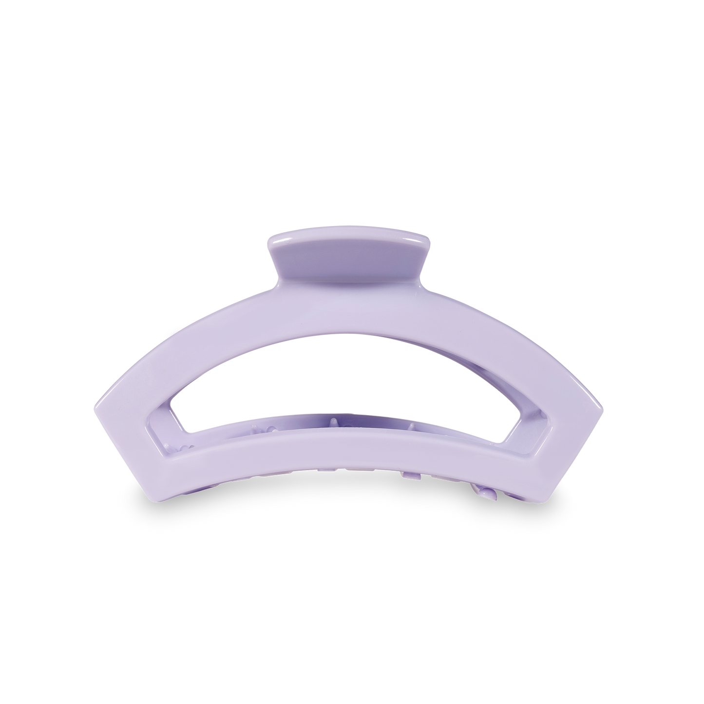 Purple hair clip on a white background