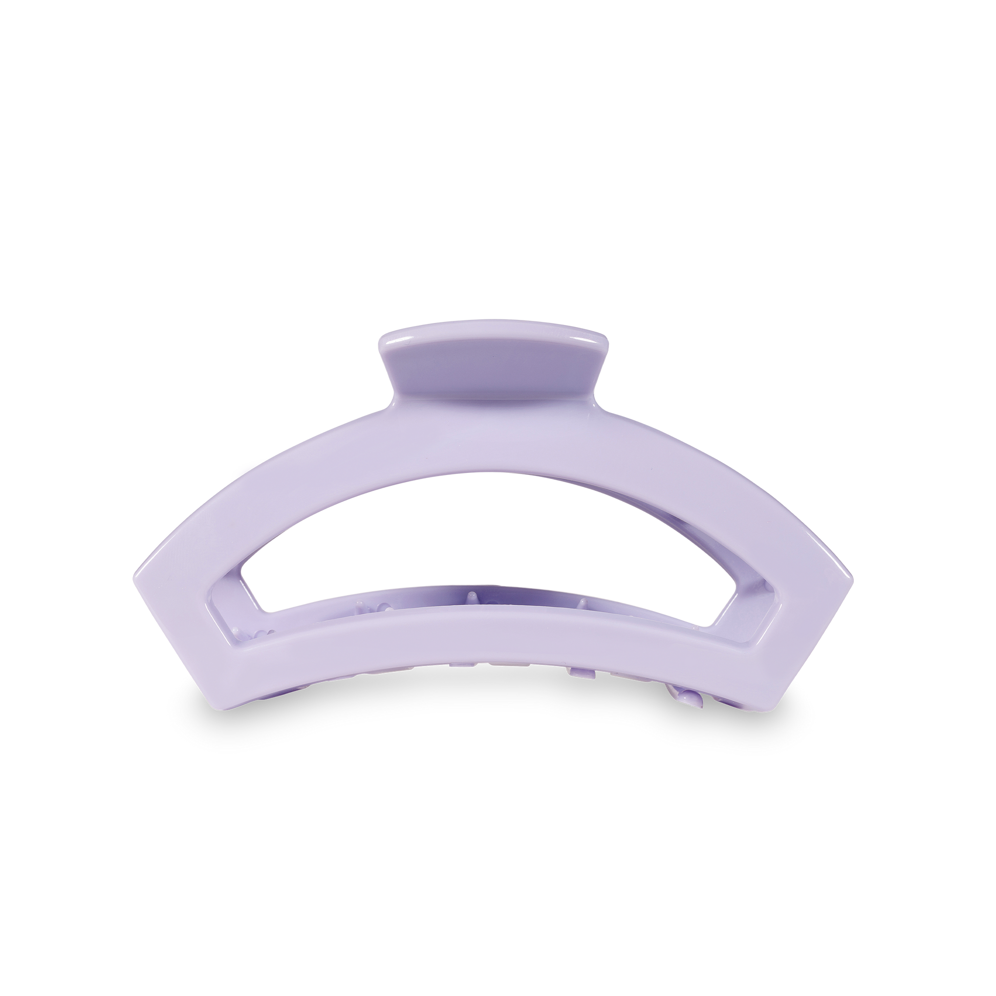 Purple hair clip on a white background