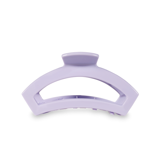 Purple hair clip on a white background