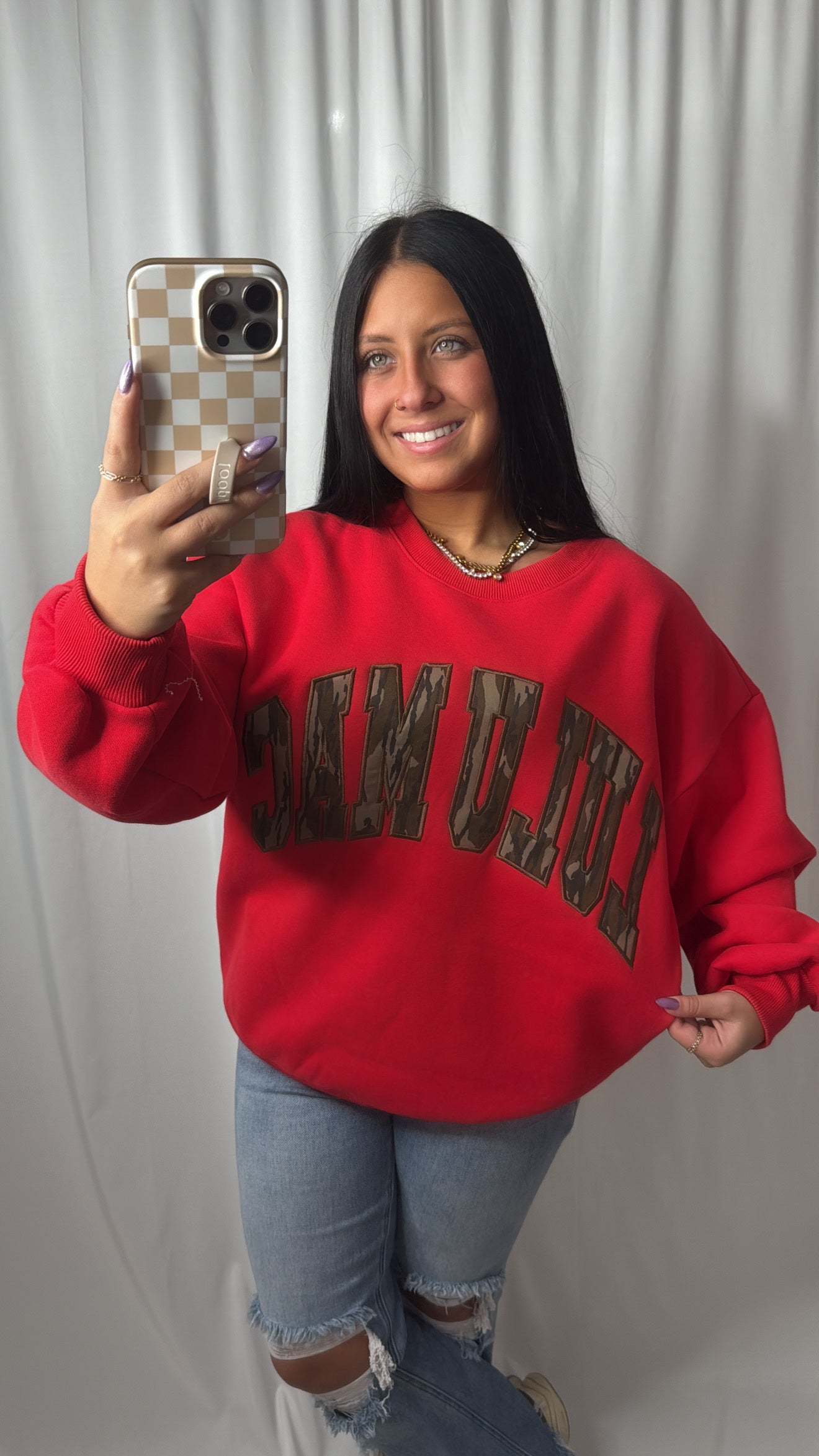Lulu Mac Red Mossy Oak Camo Sweatshirt with a girl taking a selfie 