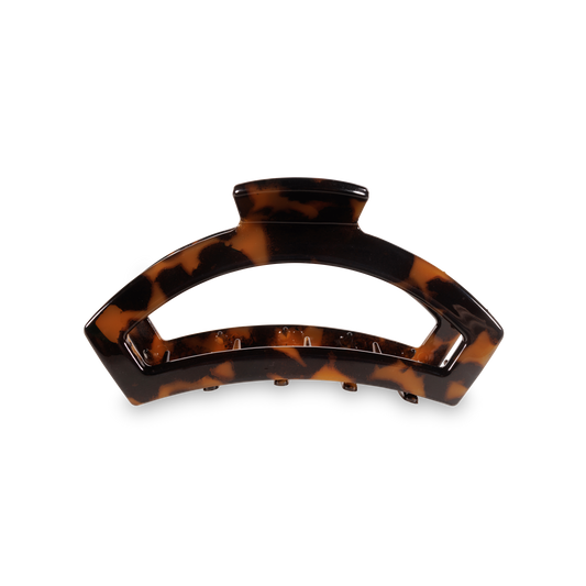 Tortoiseshell hair clip on a white background