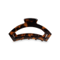 Tortoiseshell hair clip on a white background