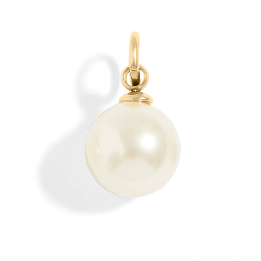 Pearl pendant with gold setting on a white background