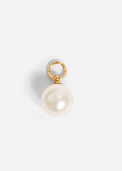 Pearl pendant with gold setting on a white background