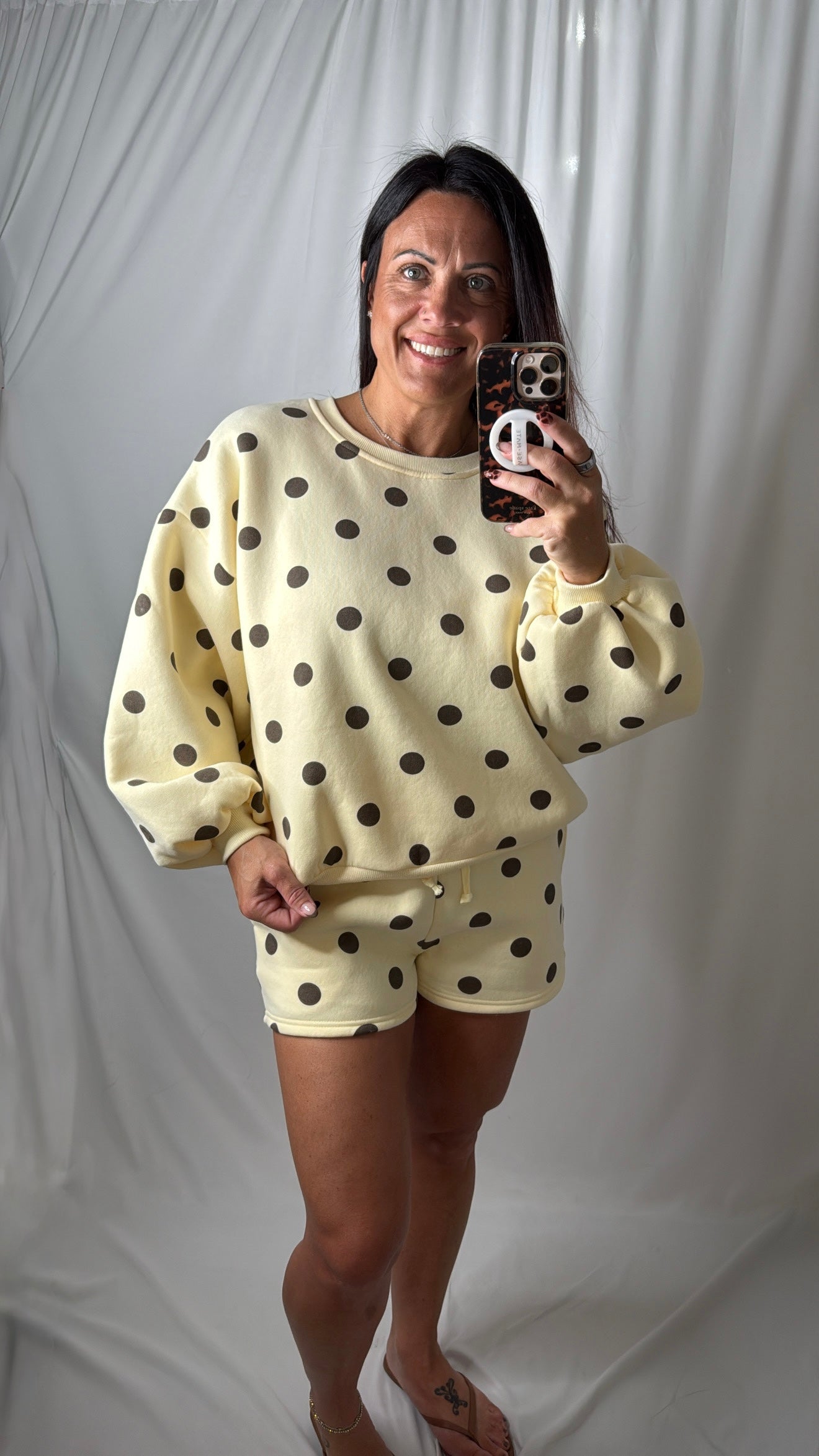 A cute trendy polka dot two piece comfy set for errands butter yellow in color with brown polka dots
