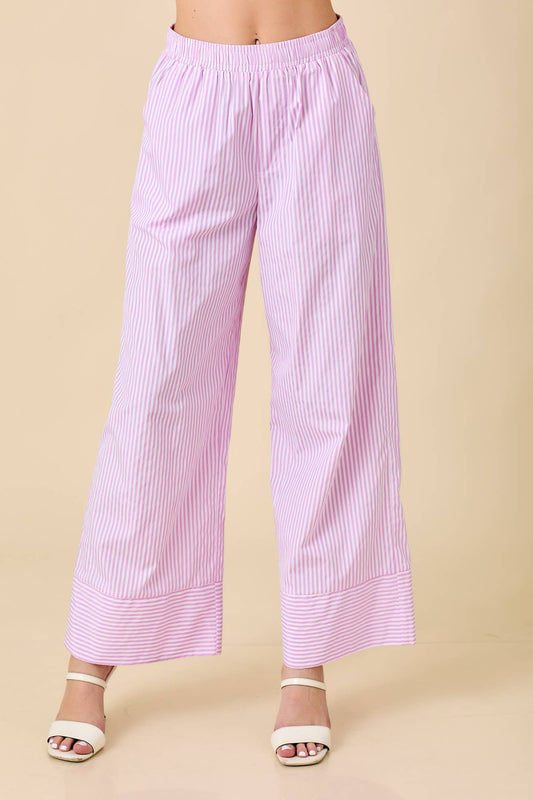 Pink striped pants on a beige background