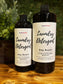 Two bottles of laundry detergent on a wooden surface with a greenery background