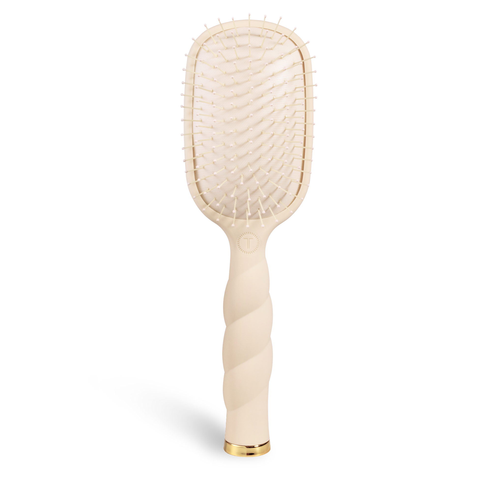 Tan teleties brush on a white background