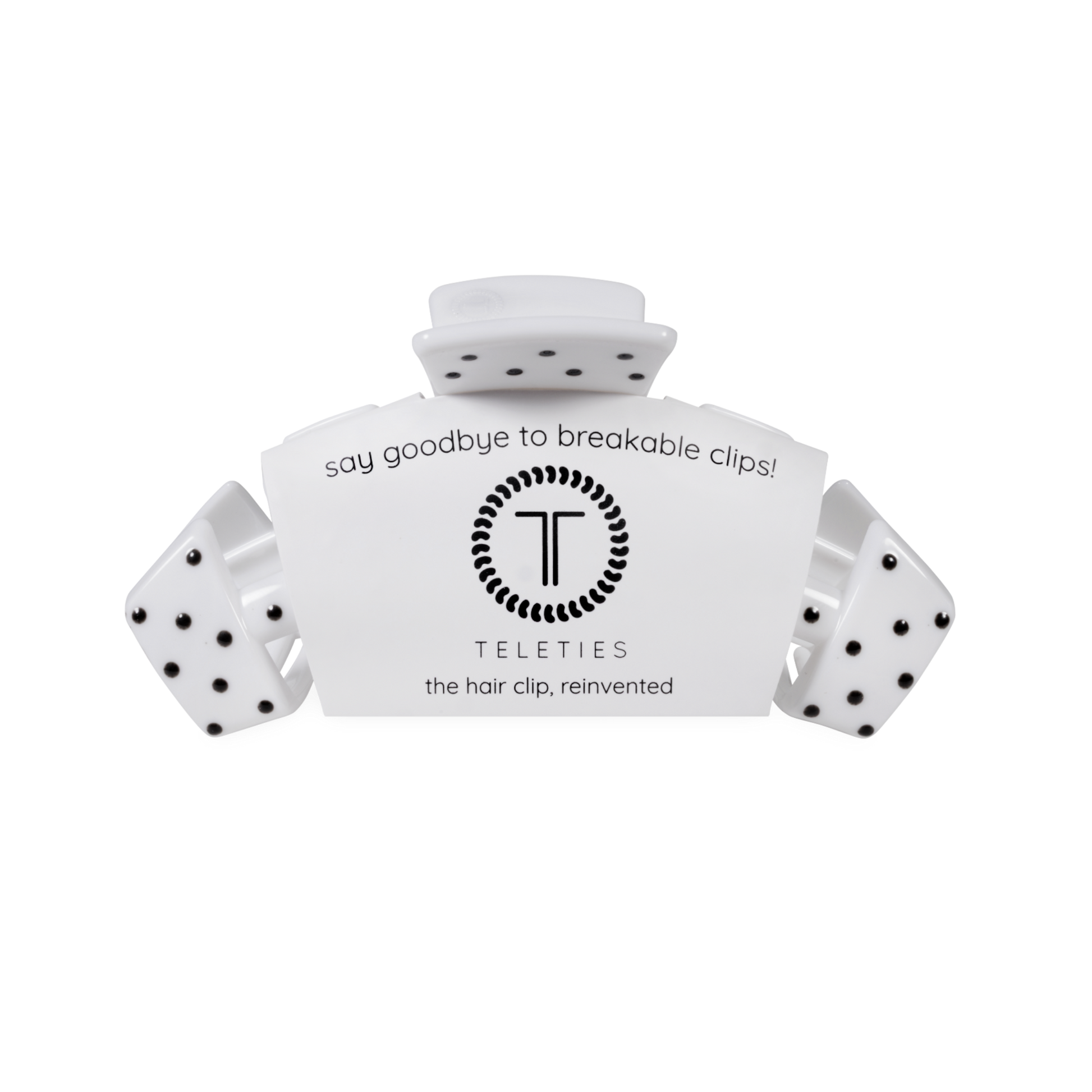 White hair clip with black polka dots and 'Teleties' branding on a white background