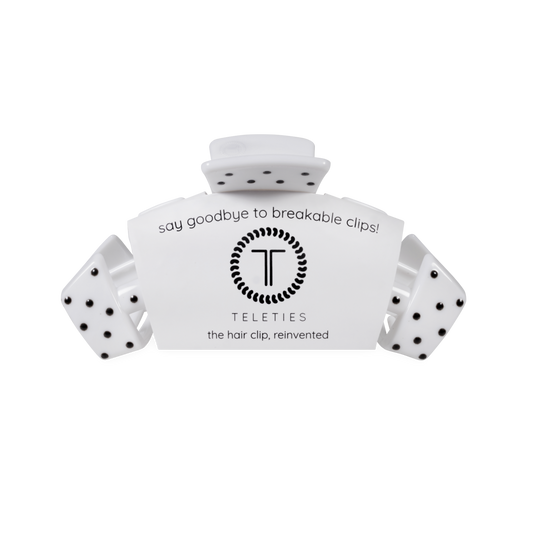 White hair clip with black polka dots and 'Teleties' branding on a white background