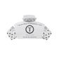 White hair clip with black polka dots and 'Teleties' branding on a white background