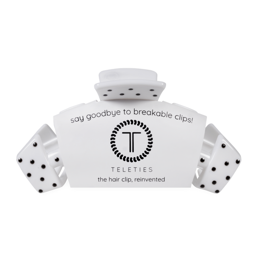 White hair clip with black accents and 'Teleties' branding on a white background