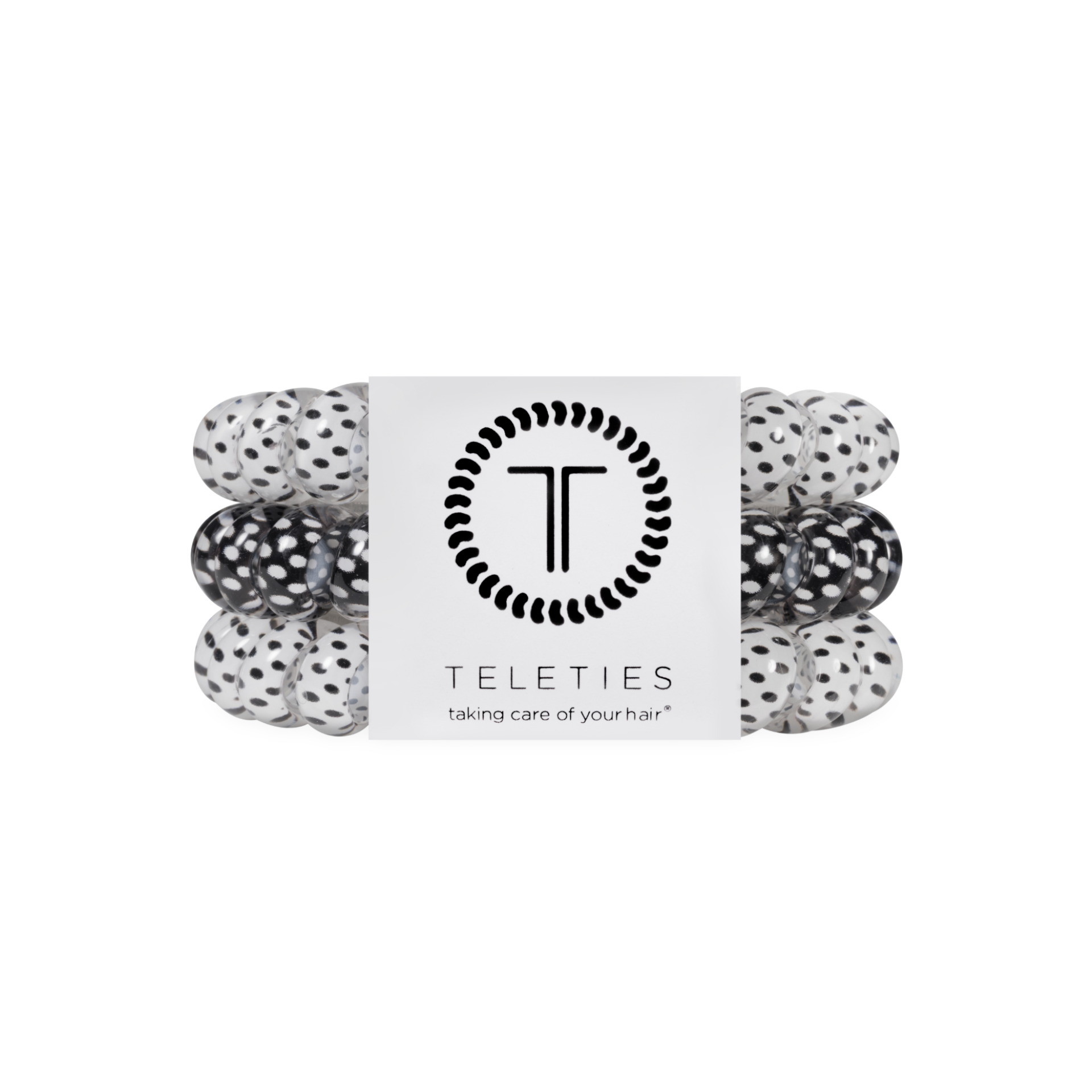 Set of black and white polka dot hair ties with a Teleties branded label on a white background