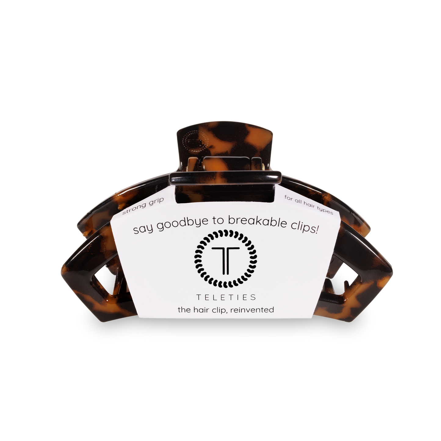 Tortoiseshell hair clip with teleties on a white background