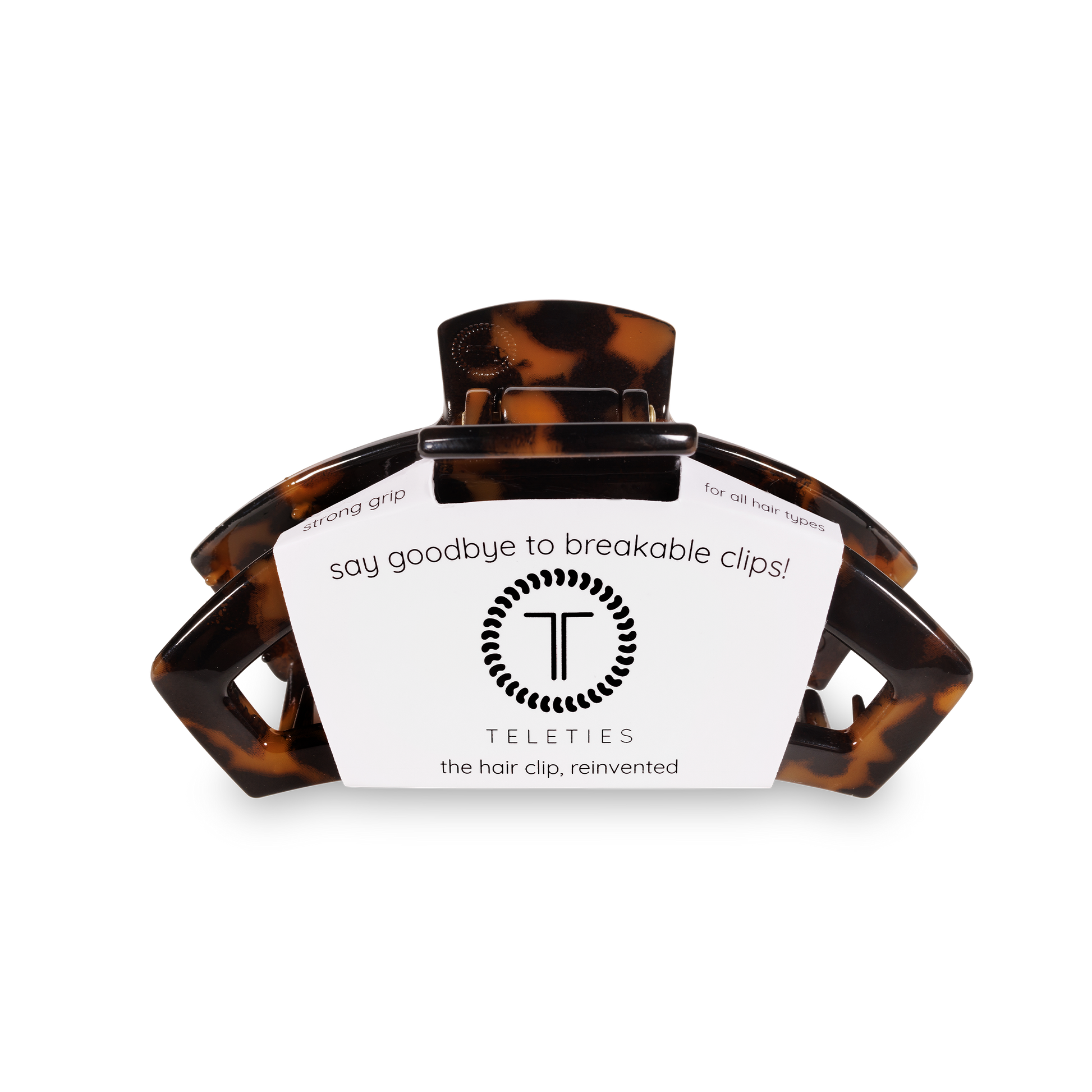 Tortoiseshell hair clip with teleties on a white background