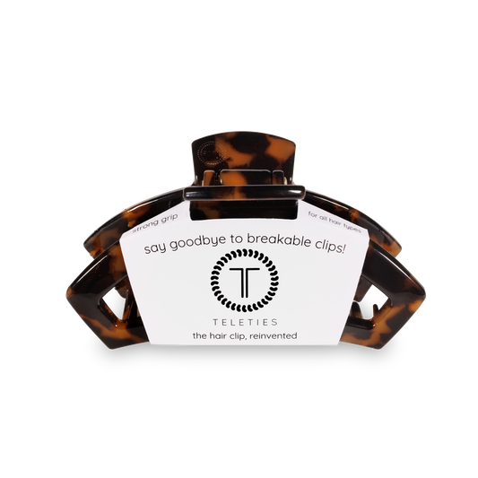 Tortoiseshell hair clip with teleties on a white background