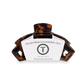 Tortoiseshell hair clip with teleties on a white background
