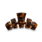 Tortoiseshell hair clip on a white background