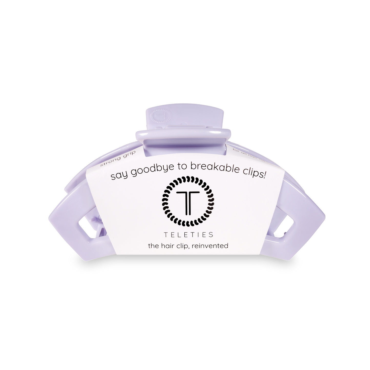 Purple hair clip with Teleties branding on a white background