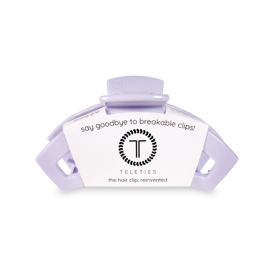 Purple hair clip with Teleties branding on a white background