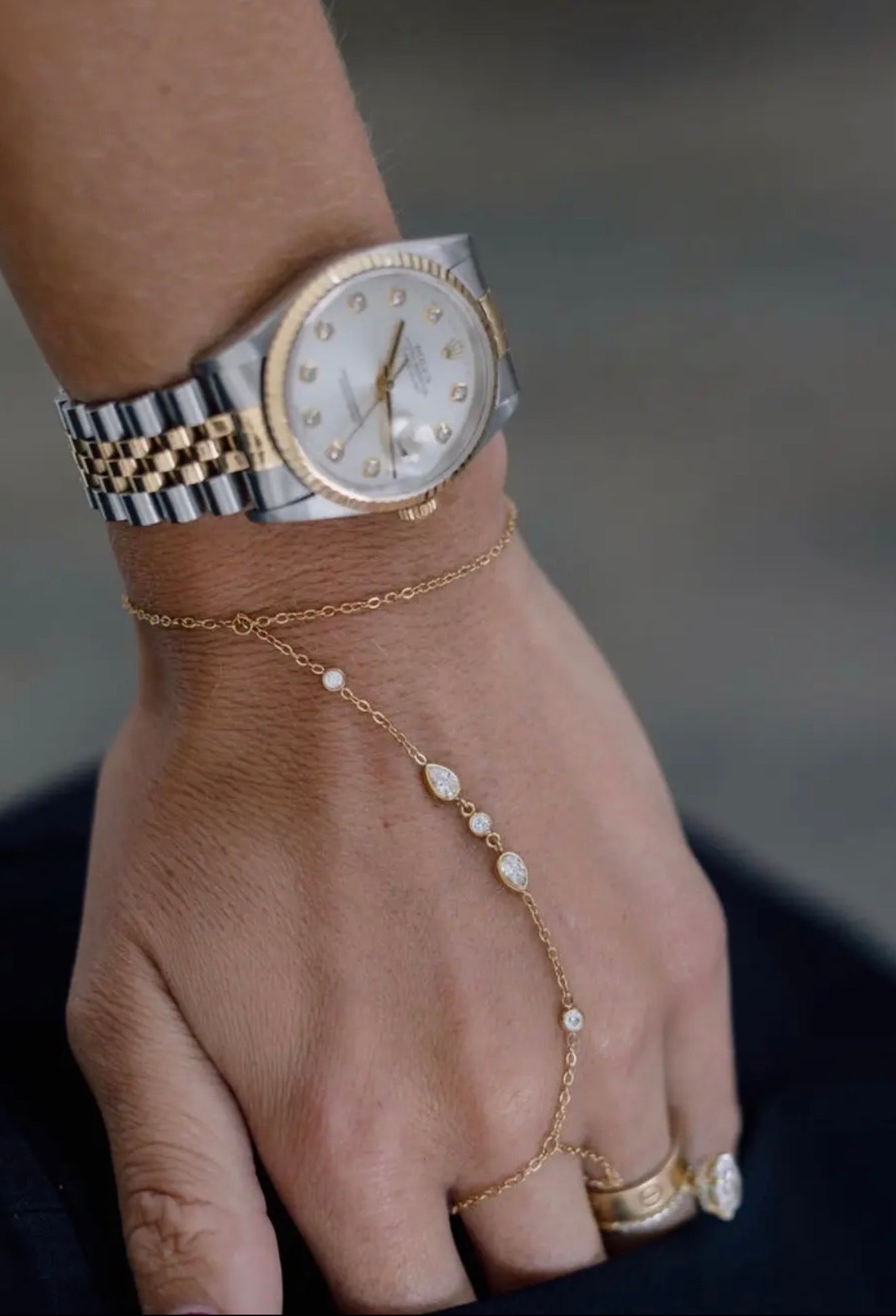 gold hand bracelet with diamond embellishments
