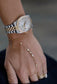 gold hand bracelet with diamond embellishments