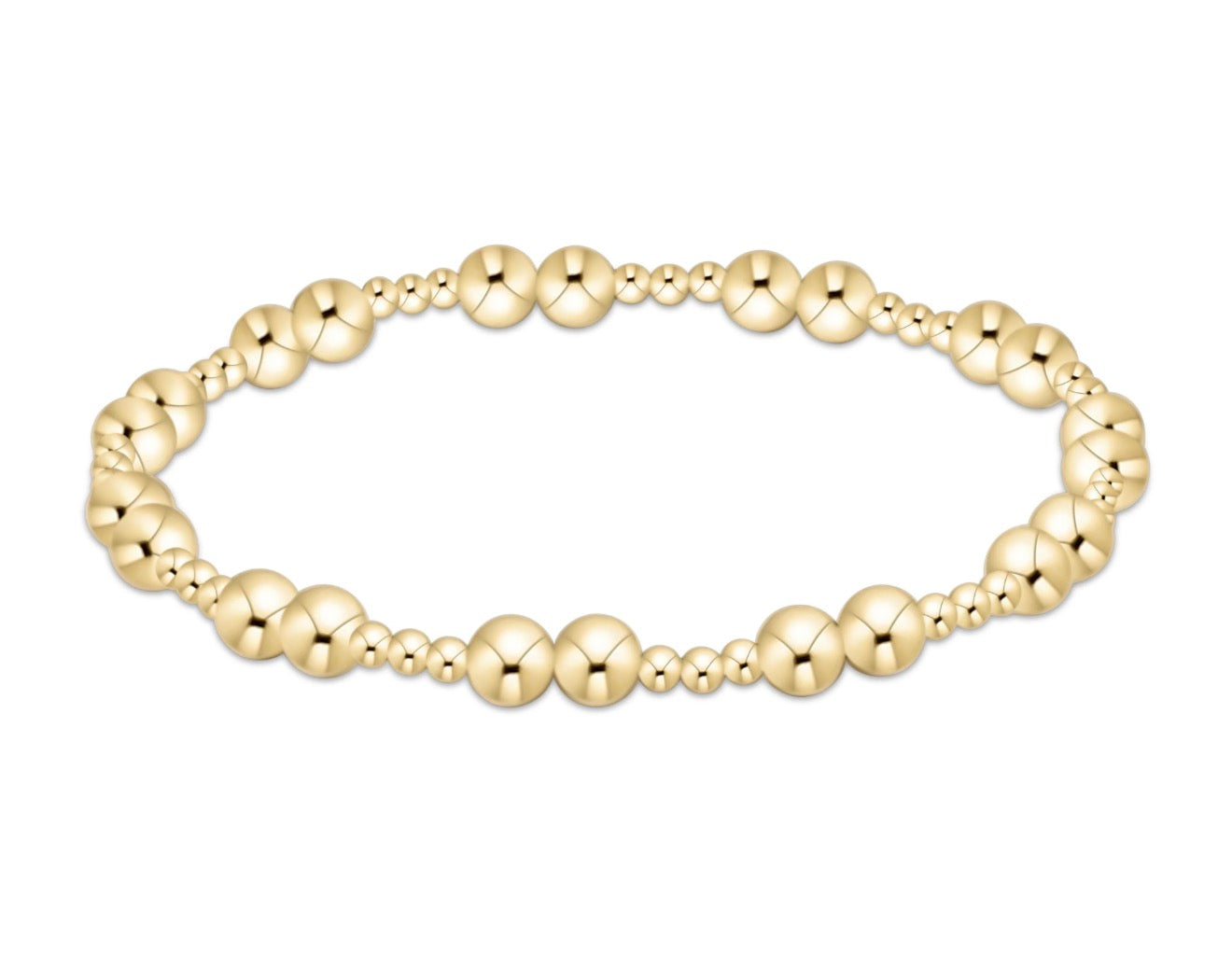 Gold enewton beaded bracelet on a white background
