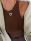 Gold heart pendant necklace with crystal accents on a delicate chain