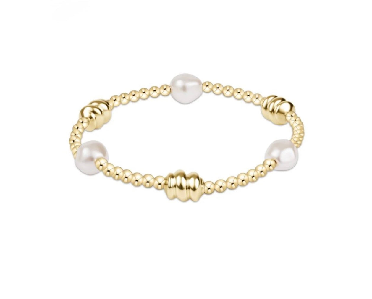Gold beaded bracelet with pearls on a white background