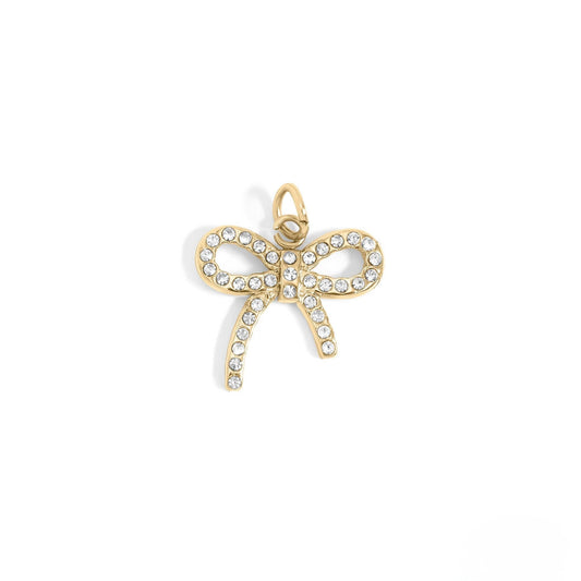 Gold bow-shaped pendant with crystals on a white background