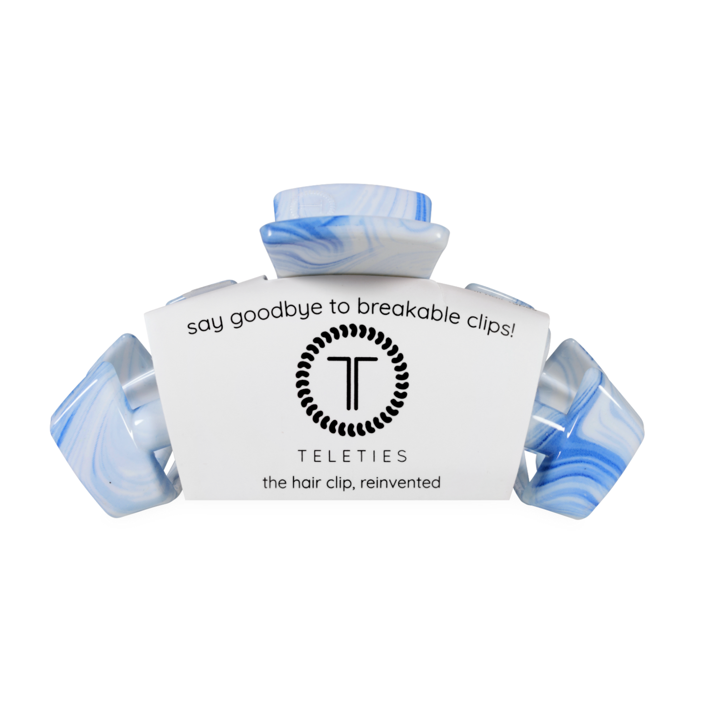 Blue and white hair clip with Teleties branding on a white background